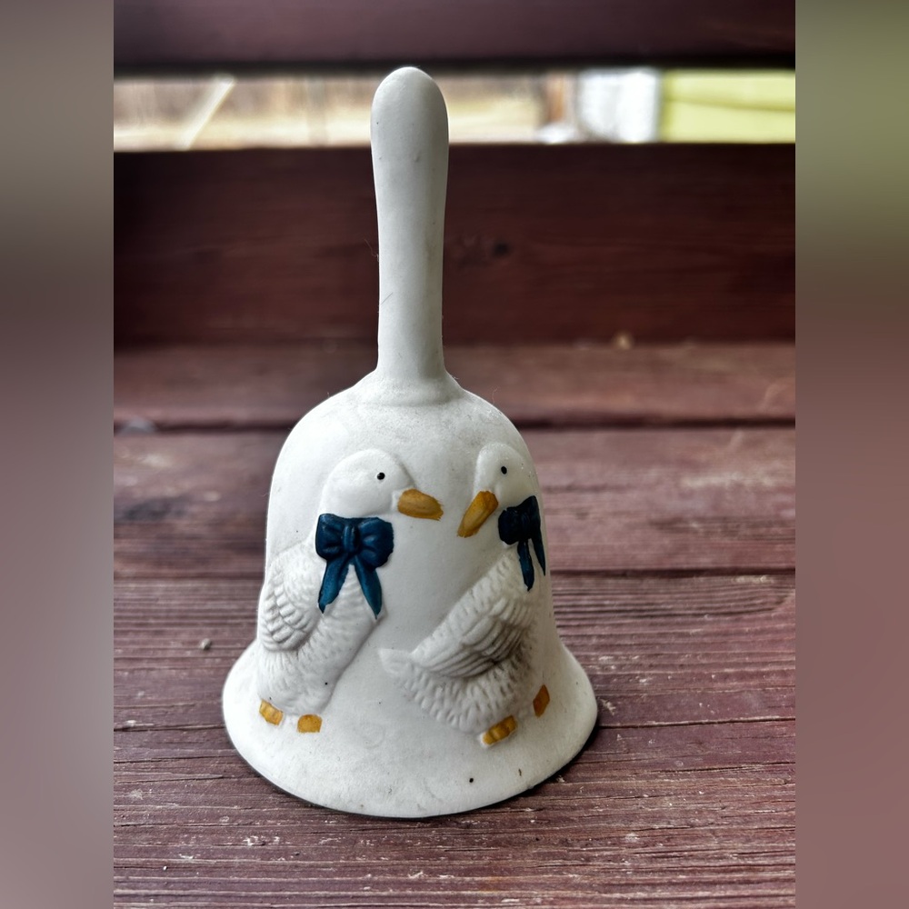 Charming White Goose Bell with Blue Accents